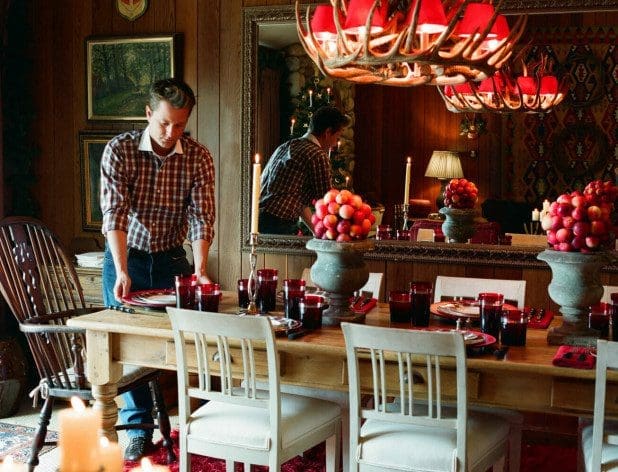 Nathan Turner setting up table for Holiday Workshop
