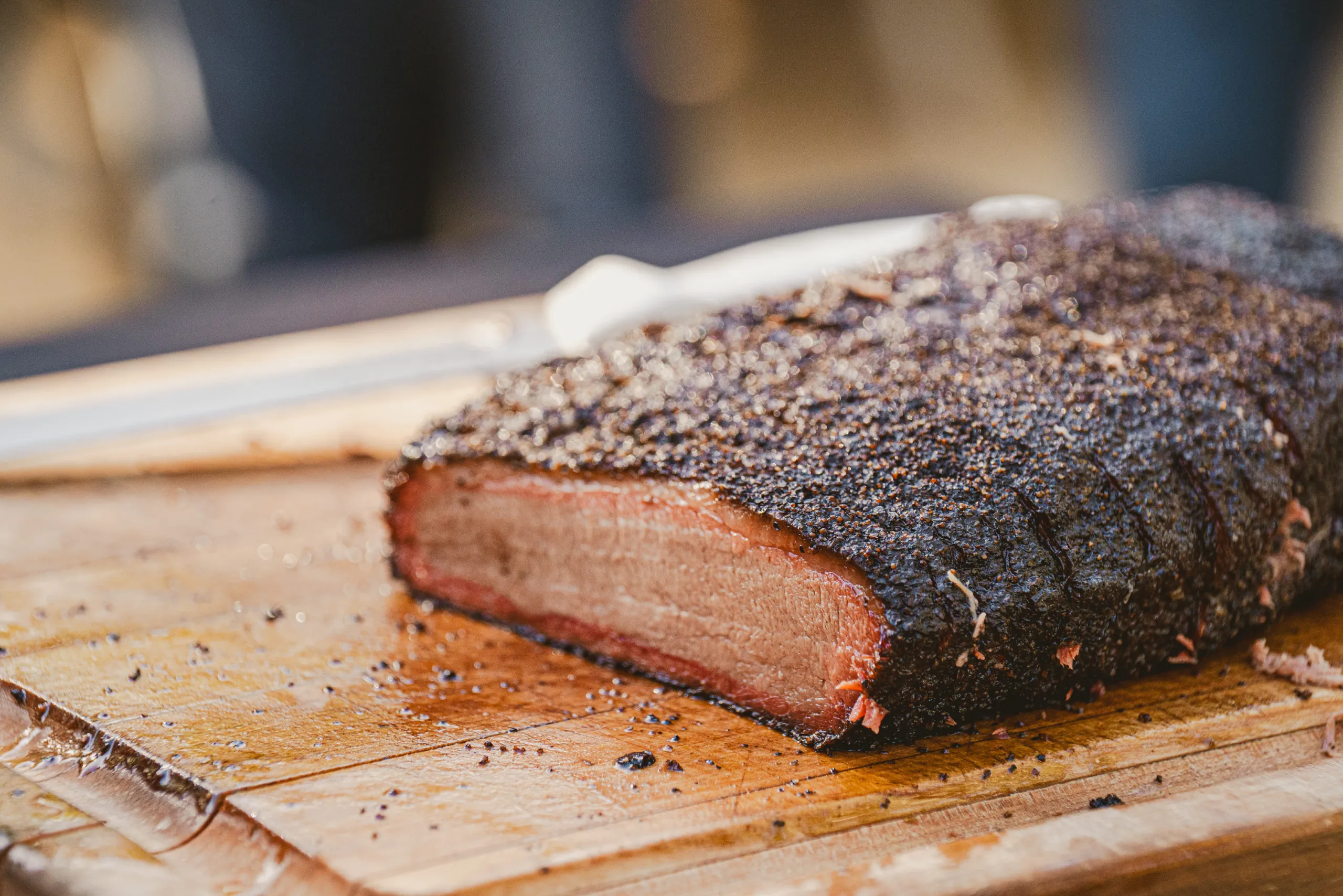 barbecue meat on a wooden cutting board