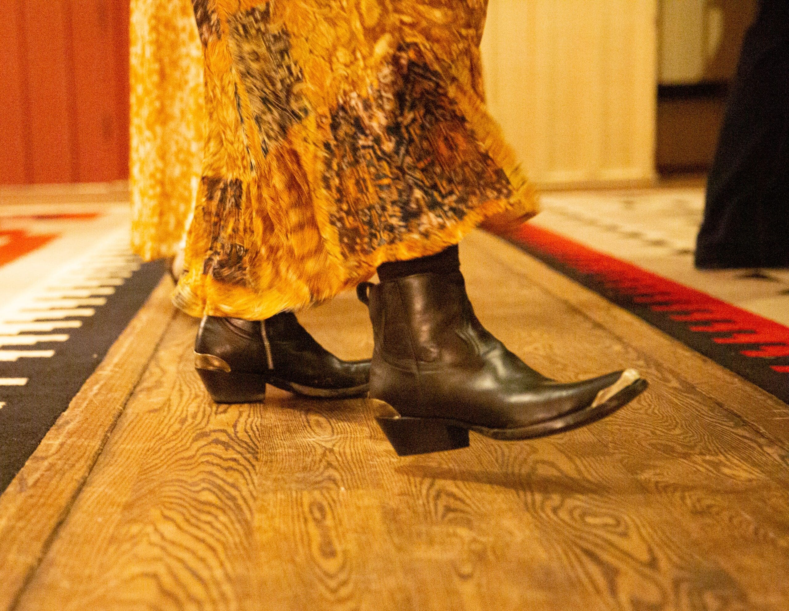 women wearing skirt and cowboy boots dancing