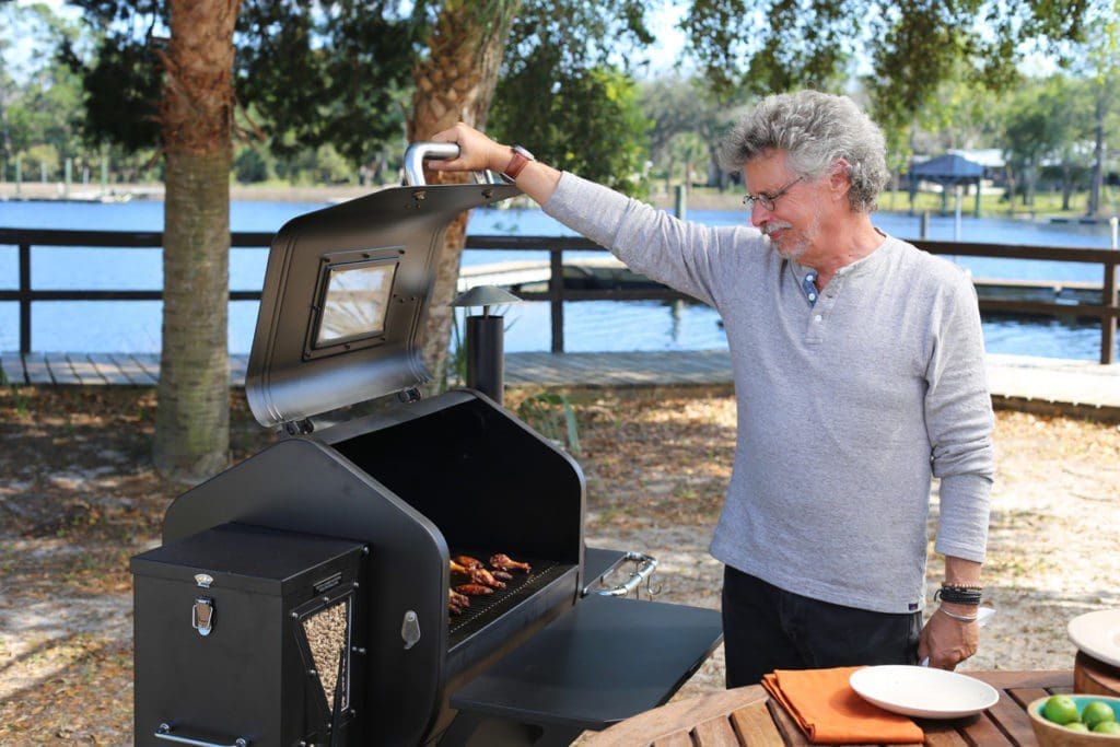 Steven Raichlen cooking on a bbq grill